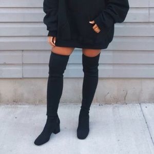 Tall black boots